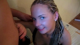 Girl with dreadlocks sucks